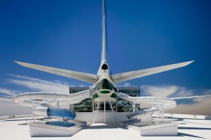 Evergreen waterpark with waterslides descending from a 747