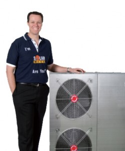 Solarwise ambassador Kieren Perkins with an Aussie-made heat pump