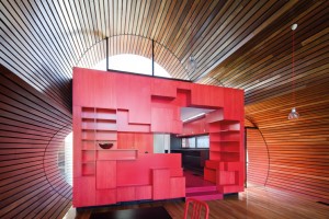 The “red box” kitchen is truly unique. Photo by John Gollings