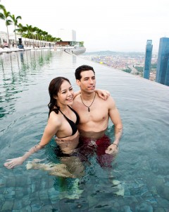 A couple enjoying the highest infinity edge pool in the world