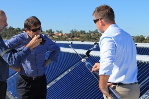 Supreme Heating WA agent Craig Doncon showing the workings of the evacuated tubing solar heating system