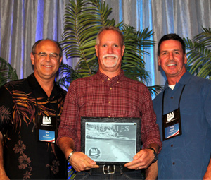 The International Distributor of the Year Award being presented to Cliff Cooke in Hawaii. 