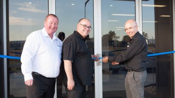 Dean Calvert (national operations manager), David Medwin (CFO) and Tony Sharpe (managing director) unveiling the new headquarters at 2 Cubitt Way, Dandenong South, Victoria