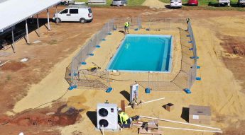 The Perth farmhouse pool under construction and the EvoHeat Force 22 being installed